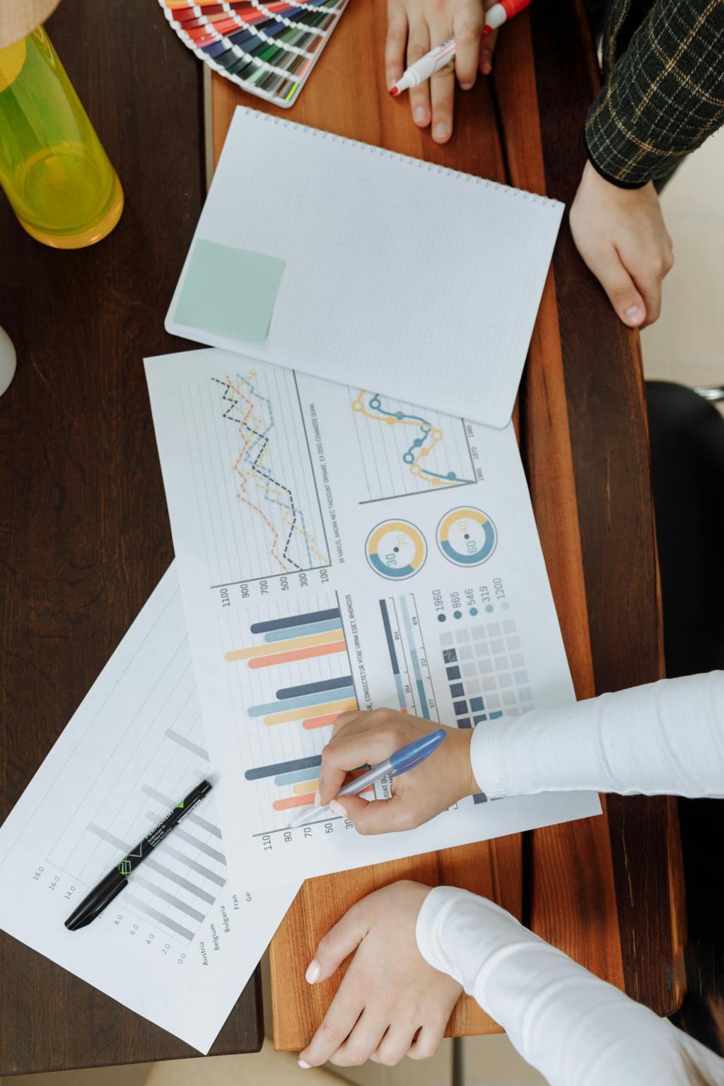 Advisors reviewing financial charts together